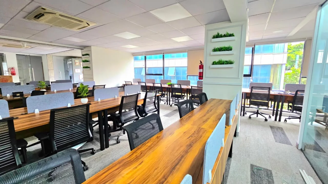 Dedicated desk workspace at The Meridian Cowork & Business Suites